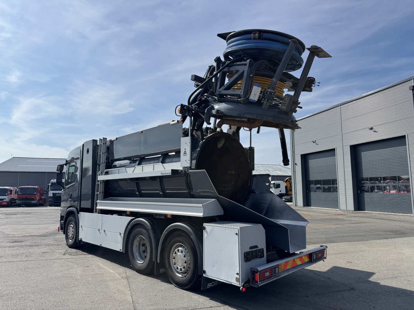 Scania G410 6x2*4 Bucher Flexline 309